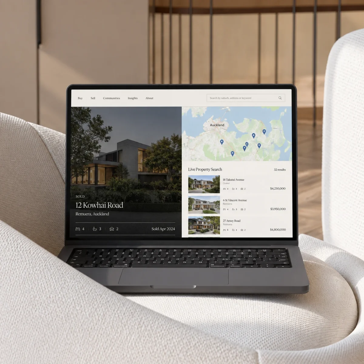 Laptop showing a live IDX property search with a map and listings next to a sold home